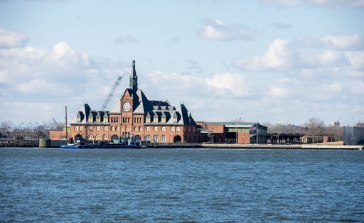 Visitors exploring explore liberty state park and ellis island