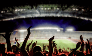 crowd cheering at a concert